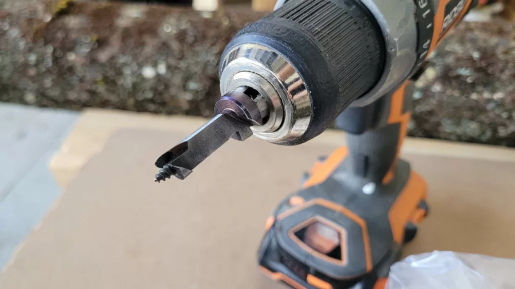 Drill bit with depth stop for using mushroom plugs on logs
